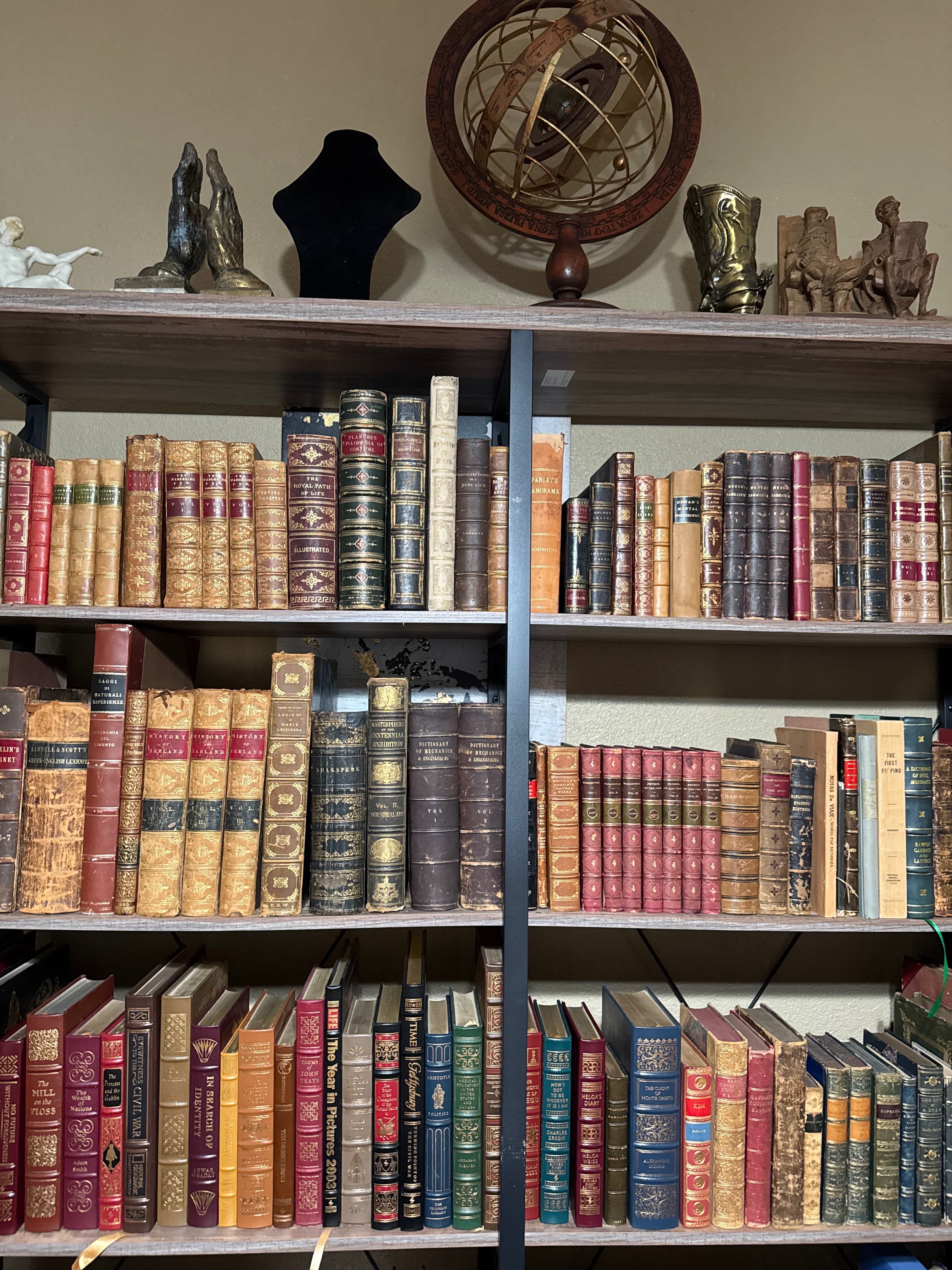 Michael's rare book collection with armillary sphere